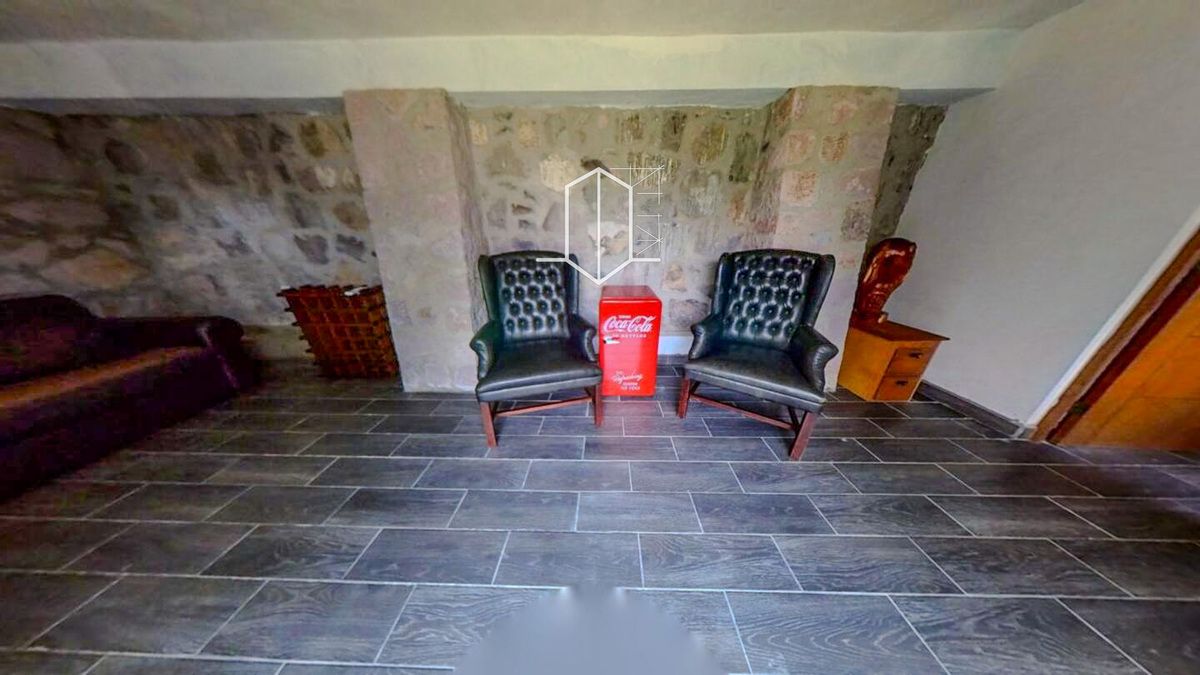 Casa Gurkha · salón de juegos